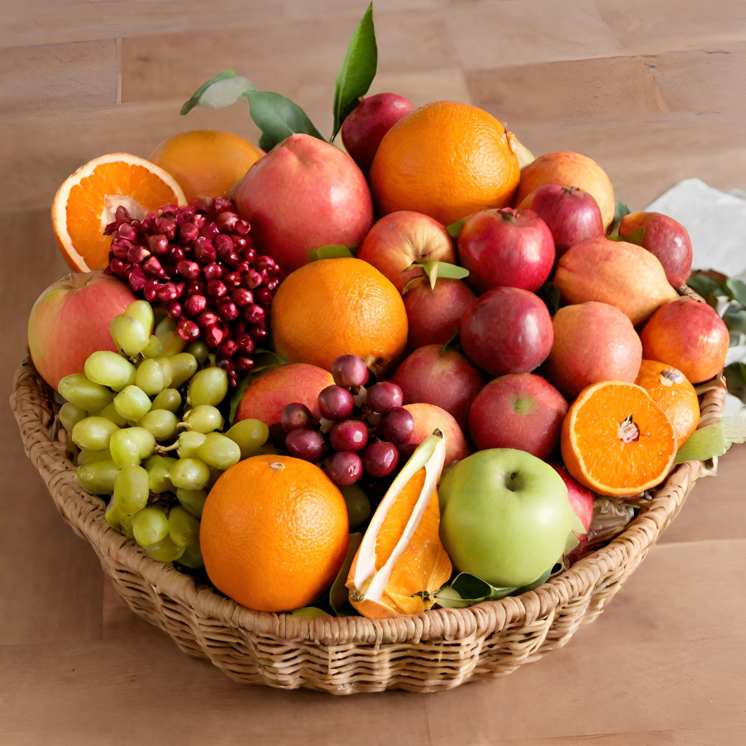 Mixed Medley Basket(500gms each of Indian orange, Pomegranate, Indian guava, Washington apple, Red seedless grapes, Mandarin, 1 box blueberry, And 1pc each of Avocado, Red dragon)